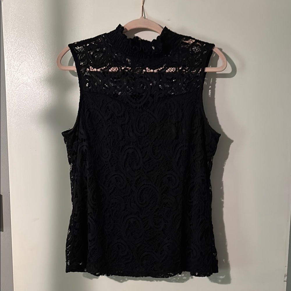 Elastic, black lace top with sweetheart neckline.